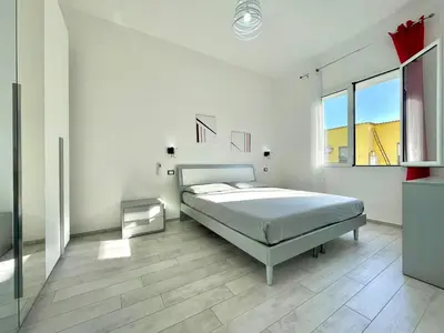 Letto o letti in una camera di La Corte di Nonna Gina