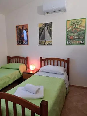 Letto o letti in una camera di Isola's Apartments