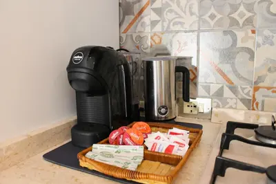 Set per la preparazione di tè e caffè presso Dimidium Apartment