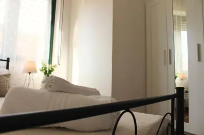Letto o letti in una camera di Dimidium Apartment