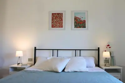 Letto o letti in una camera di Dimidium Apartment
