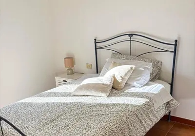 Letto o letti in una camera di Dimidium Apartment