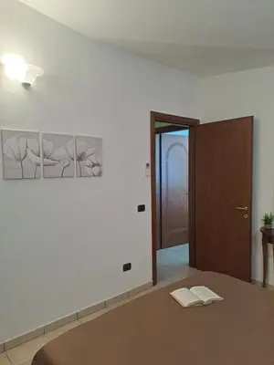 Letto o letti in una camera di Casa Flo