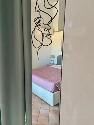 Letto o letti in una camera di Casa Vacanza Suite Violet