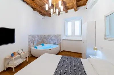 Letto o letti in una camera di Vsuite livingchic
