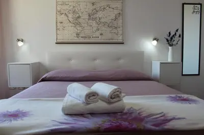 Letto o letti in una camera di POESIS ROOM