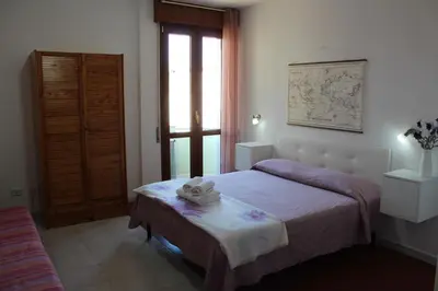 Letto o letti in una camera di POESIS ROOM