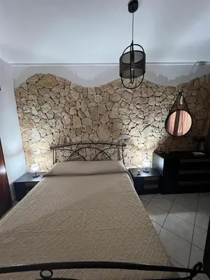 Letto o letti in una camera di Villa Azzurra Fronte Mare