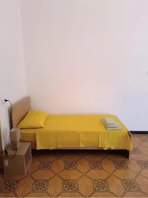 Letto o letti in una camera di Bed and breakfast da LICCU