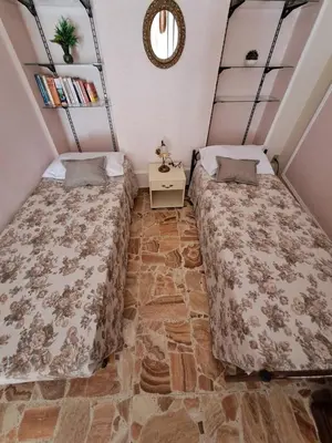 Letto o letti in una camera di Da Isa