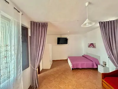 Letto o letti in una camera di Apartment Piras&Tascedda Grazioso Appartamento Vicino al Centro