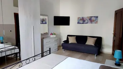 Letto o letti in una camera di OKIROS