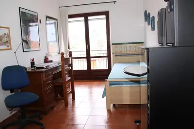 Cucina o angolo cottura di Corallo Rosa-Casa Vacanze