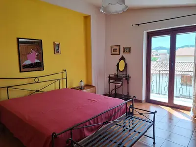 Letto o letti in una camera di Corallo Rosa-Casa Vacanze