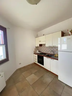 Cucina o angolo cottura di Le Peonie 2 - mare Sardegna