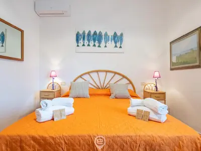 Letto o letti in una camera di Villa Bluebell