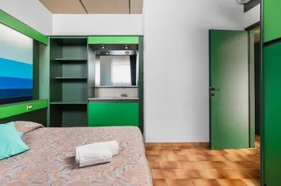 Letto o letti in una camera di Ecovillage with swimming-pool surrounded by greenery, apartments with air conditioning and outdoor private area