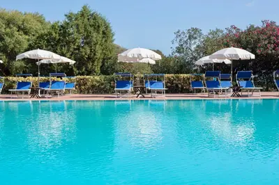 Piscina di Ecovillage with swimming-pool surrounded by greenery, apartments with air conditioning and outdoor private area o nelle vicinanze