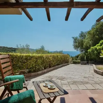 Ecovillage with swimming-pool surrounded by greenery