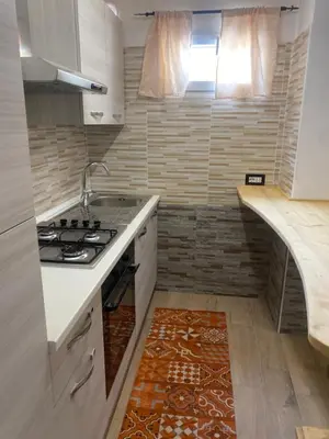 Cucina o angolo cottura di Monolocale indipendente nel quartiere residenziale Genneruxi