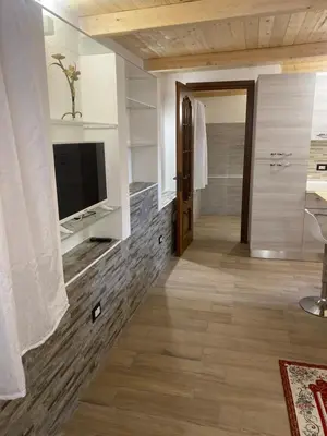 Cucina o angolo cottura di Monolocale indipendente nel quartiere residenziale Genneruxi