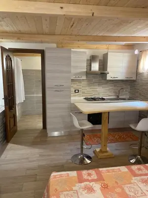 Cucina o angolo cottura di Monolocale indipendente nel quartiere residenziale Genneruxi