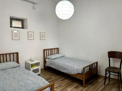 Letto o letti in una camera di Casa Cadoni