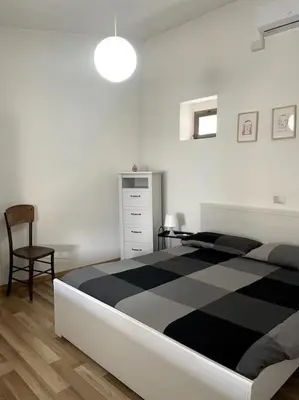 Letto o letti in una camera di Casa Cadoni