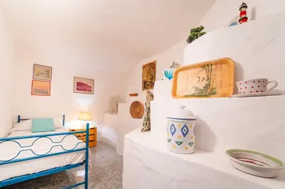 Letto o letti in una camera di Casa Daniela, Chia Sea View SouthSardiniaHolidays