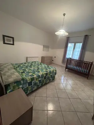 Letto o letti in una camera di Casa Sophie