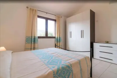 Letto o letti in una camera di Il Girasole - Appartaments