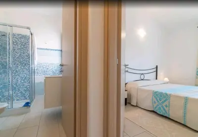 Letto o letti in una camera di Il Girasole - Appartaments