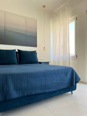 Letto o letti in una camera di Il Nido