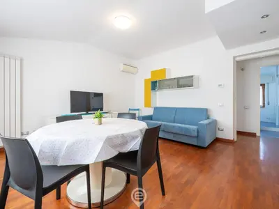 Area soggiorno di Iris Apartment