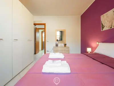 Letto o letti in una camera di Dahlia Apartment
