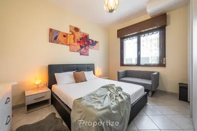 Letto o letti in una camera di Sun Terrace Home by Propertize