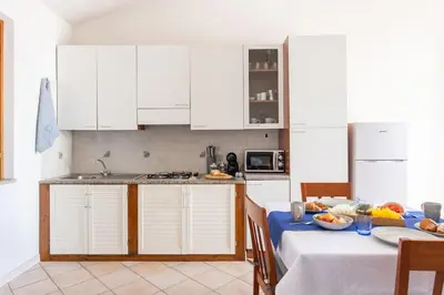 Cucina o angolo cottura di Funtana Meiga Casa vista mare - Free wifi