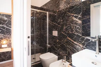 Bagno di New Elegance Suites Guesthouse