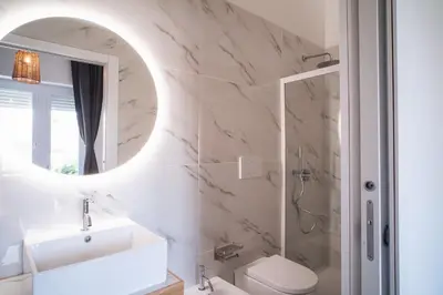 Bagno di New Elegance Suites Guesthouse