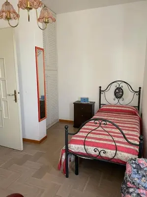 Letto o letti in una camera di La Maison Apache Gonnesa Cod IUN: R8196