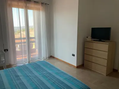 Letto o letti in una camera di La Maison Apache Gonnesa Cod IUN: R8196