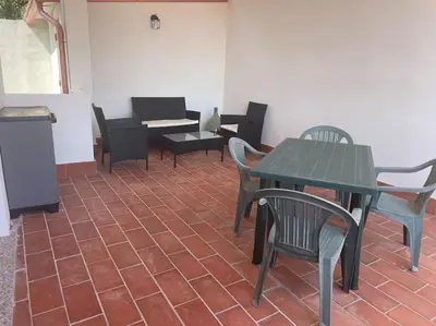 Area soggiorno di La Maison Apache Gonnesa Cod IUN: R8196