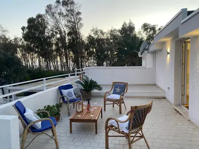 Balcone o terrazza di Luxury Villa Turquoise road to Villasimius 50 m from the sea IUN S0573