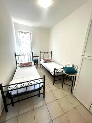 Letto o letti in una camera di La Casa del Melograno