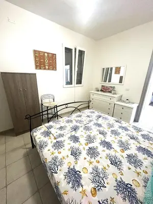 Letto o letti in una camera di La Casa del Melograno