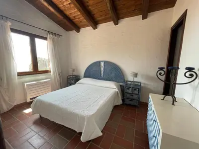 Letto o letti in una camera di Lo Scirocco Tanca Piras