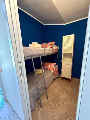 Letto o letti in una camera di Casa Vacanze Eloise