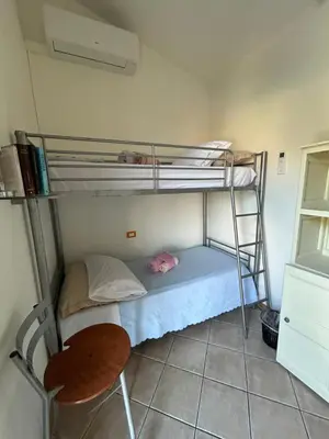 Letto o letti in una camera di Casa Vacanze Eloise