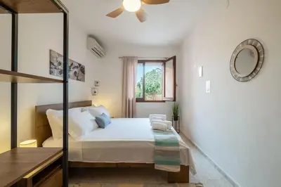 Letto o letti in una camera di Sant'Andrea Villa- 300m From the Beach- Easy Parking- Netflix-Self Check-in