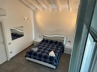 Letto o letti in una camera di Le Potager